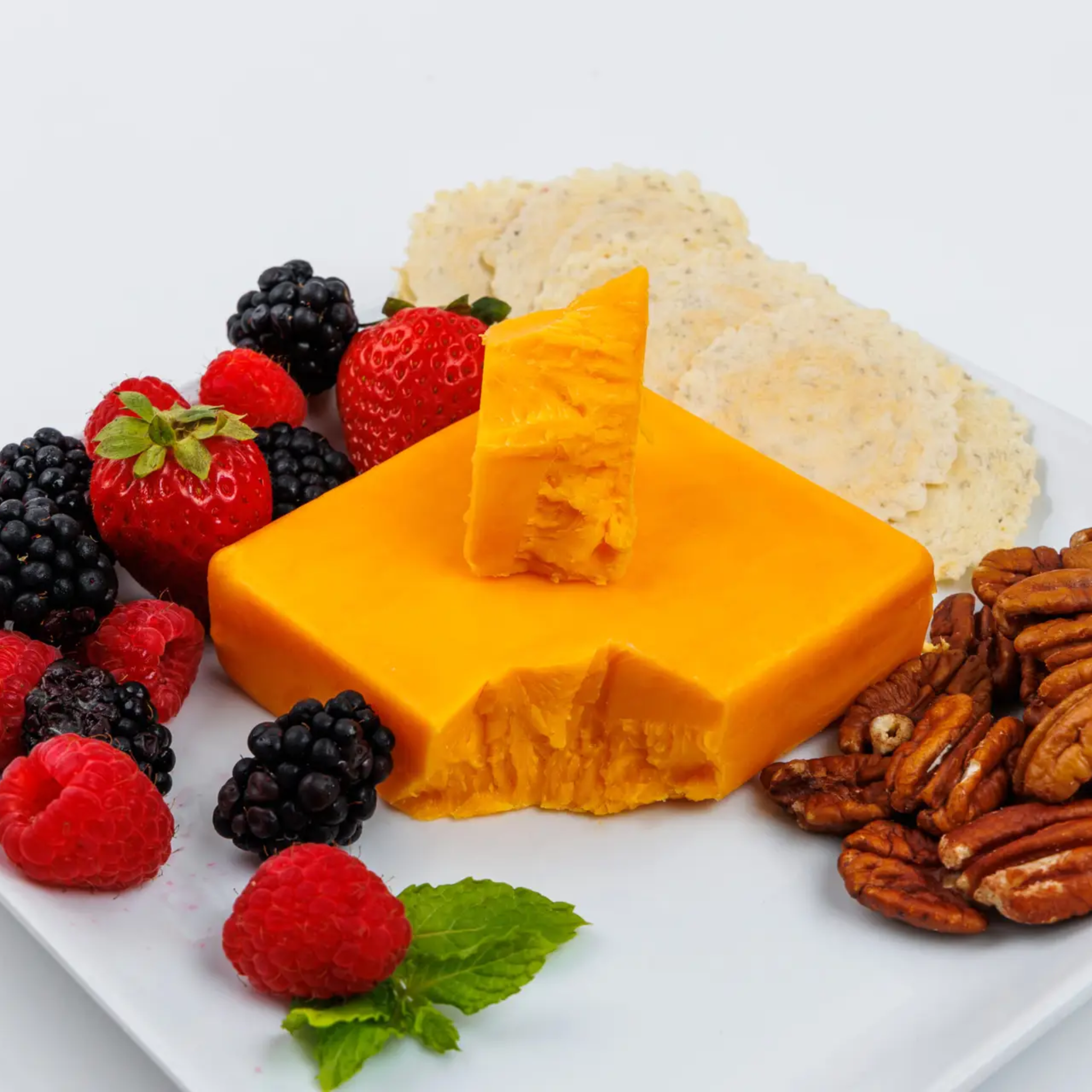 Renard's One Year Sharp Cheddar Cheese on a Plate