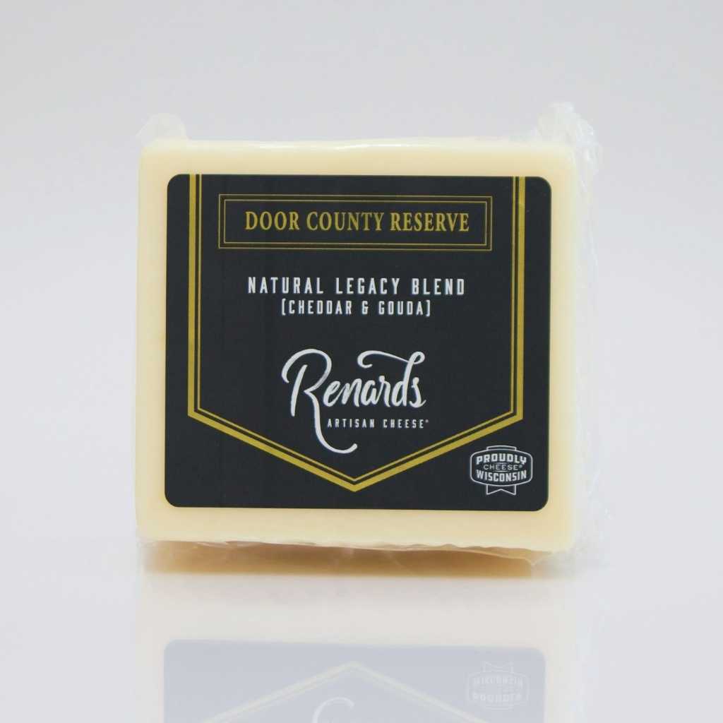 Packaged Legacy Blend Cheese facing forward against a gray background