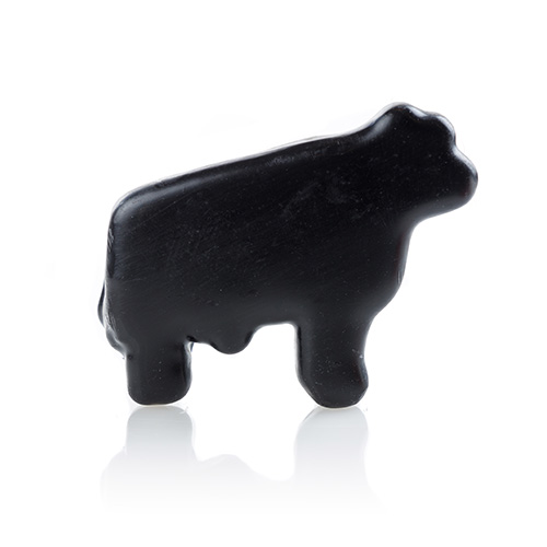 black cow shaped cheddar cheese